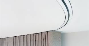 Recessed curved drapery track systems